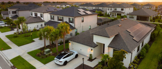 American gated community houses in rural US suburbs. View from above of large residential homes in small town in southwest Florida American gated community houses in rural US suburbs. View from above of large residential homes in small town in southwest Florida.