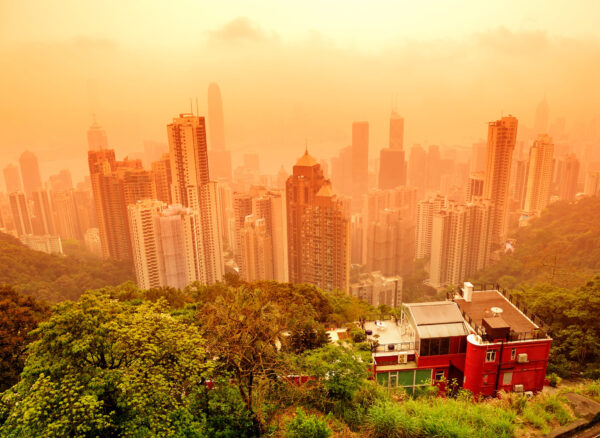 Hong Kong Hong Kong cityscape with mountain in red tone.