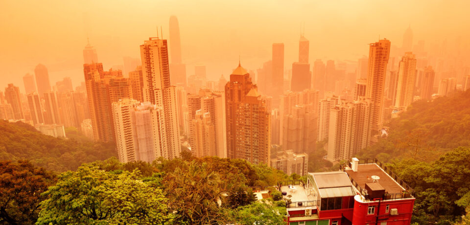 Hong Kong Hong Kong cityscape with mountain in red tone.